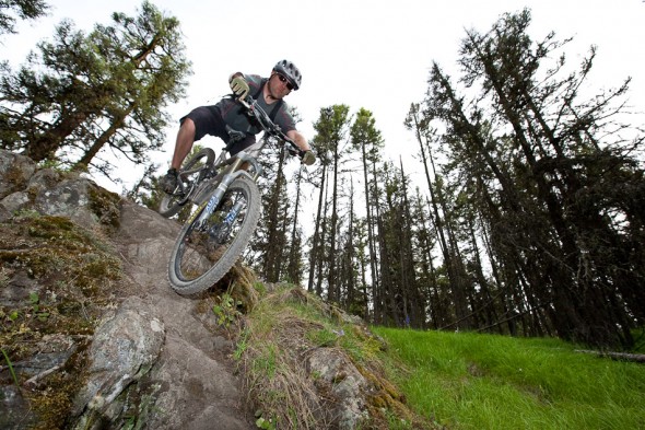 Ben riding a steep drop on a local ride