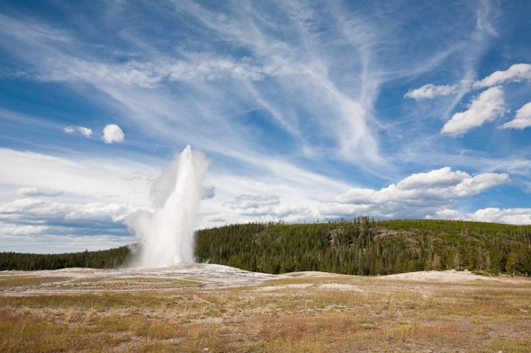 Old Faithful - an American icon - does its thing in front of a crowd of hundreds