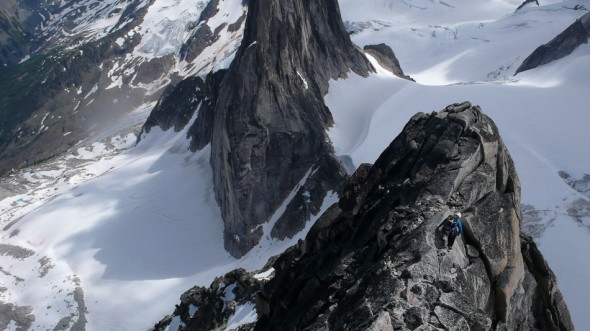 Descending near the south summit, top of the Kain Route. Snowpatch Spire in the background