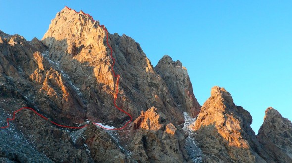 Exum Ridge Direct, Grand Teton. The standard Exum Ridge is gained via a traverse high on the mountain called Wall Street and is mostly low 5th class climbing (up to grade 13). The Exum Direct takes the line as shown and includes 6-7 pitches of 5.6 -5.7 climbing (grade 15/16) before joining the Exum higher up.  
