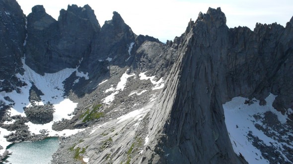 The blade-like peak of Wolfs Head (first climbed and named by Fred Beckey in the 60s). We climbed the East Ridge - facing the camera and half in shadow/light