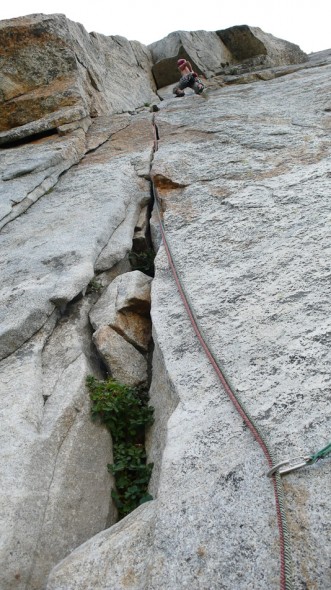 Pitch three on the Central Pillar of Frenzy - hands up to a roof, then low angle offwidth above - nice training... [photo by Hana]