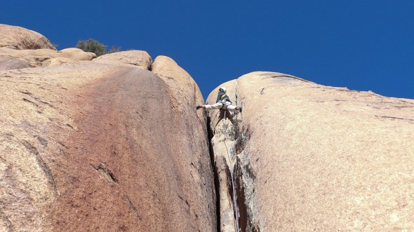 Dave leading the chimney/offwidth on the final pitch of route 1, Squaretop