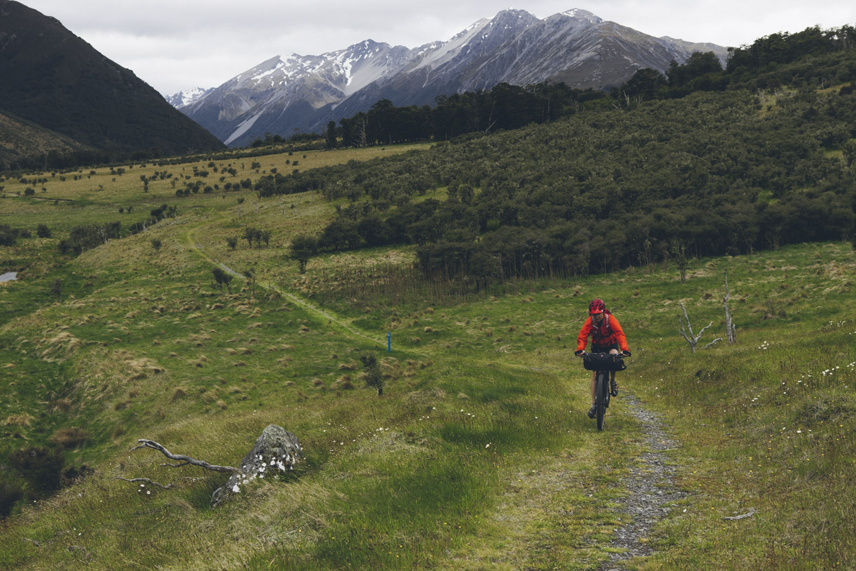 Biking the Waiau towards the Ada River confluence.