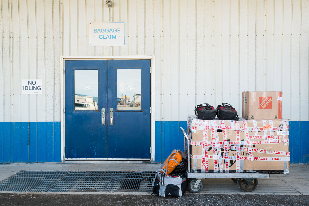 Arrival at Deadhorse. After months of preparation, the moment finally crystallises and we're outside the terminal of the Deadhorse Airport with two bike boxes, a carton and large tennis bag we bought for a few bucks in a charity shop. We'll leave Deadhorse with five days food and all our posessions in panniers and our Revelate Designs bikepacking kit.