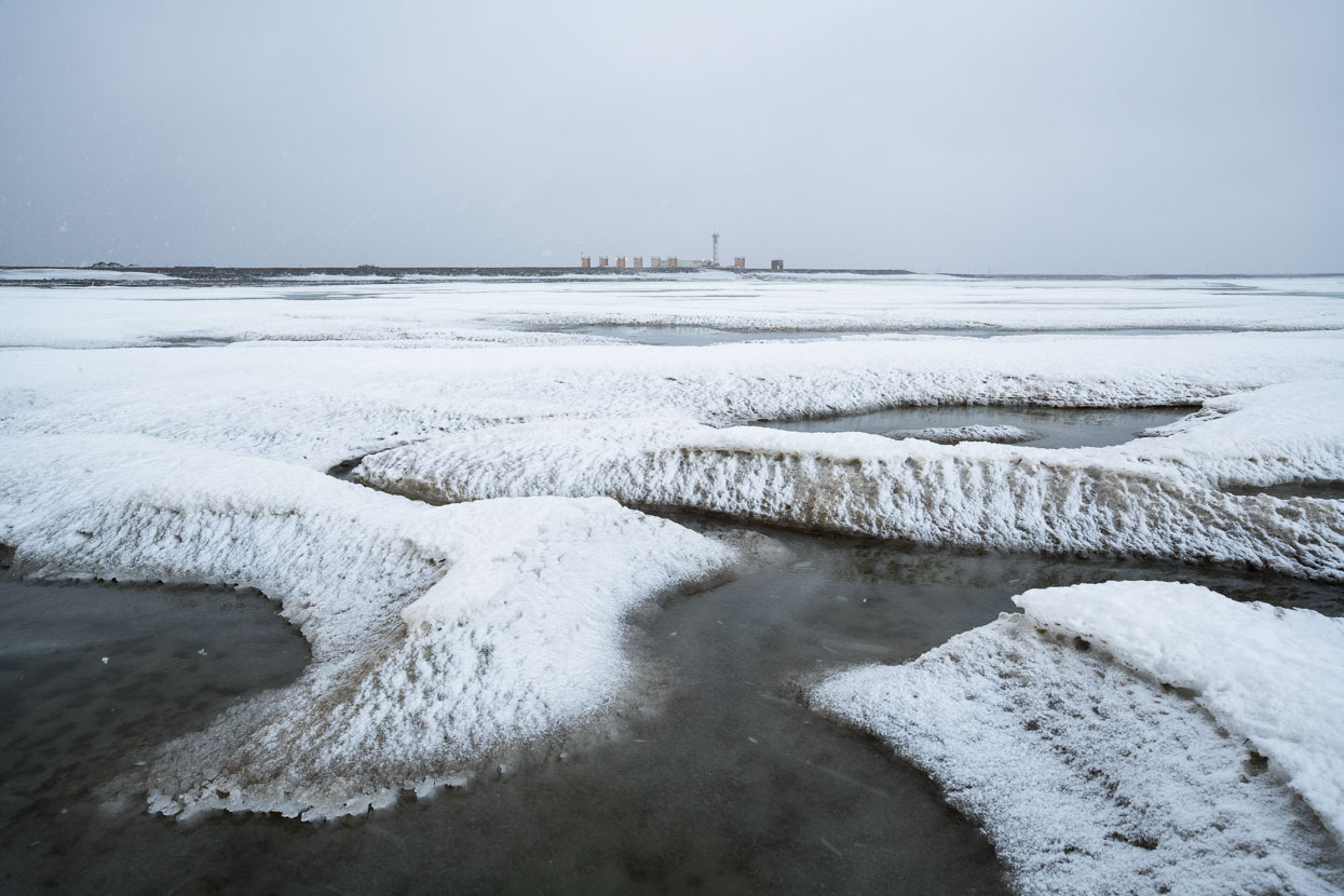 During sleet showers we took a tour to the Arctic Ocean to check out the sea ice - this is looking across Prudhoe Bay.