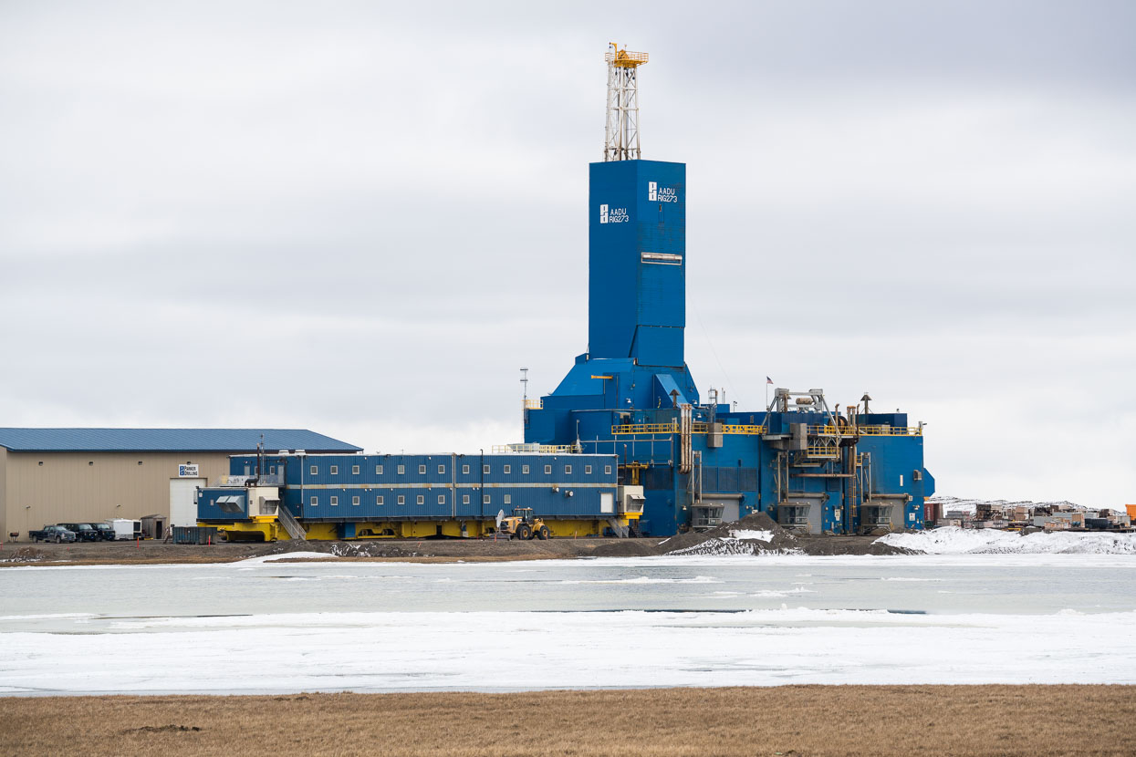 The bulky shapes of oil derricks dot the landscape surrounding Deadhorse.