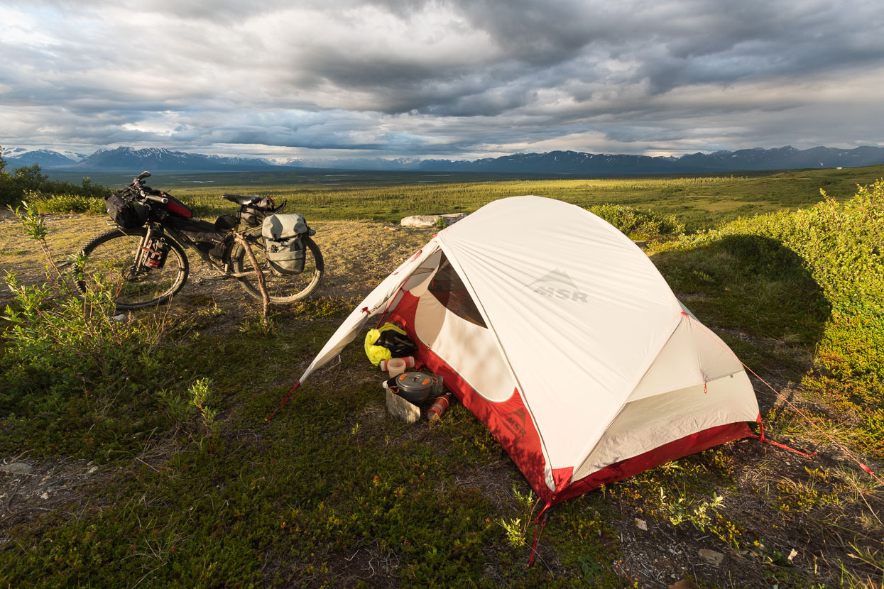 Camp for the night is by a small lake, just a stone's throw from the highway but with an epic view.