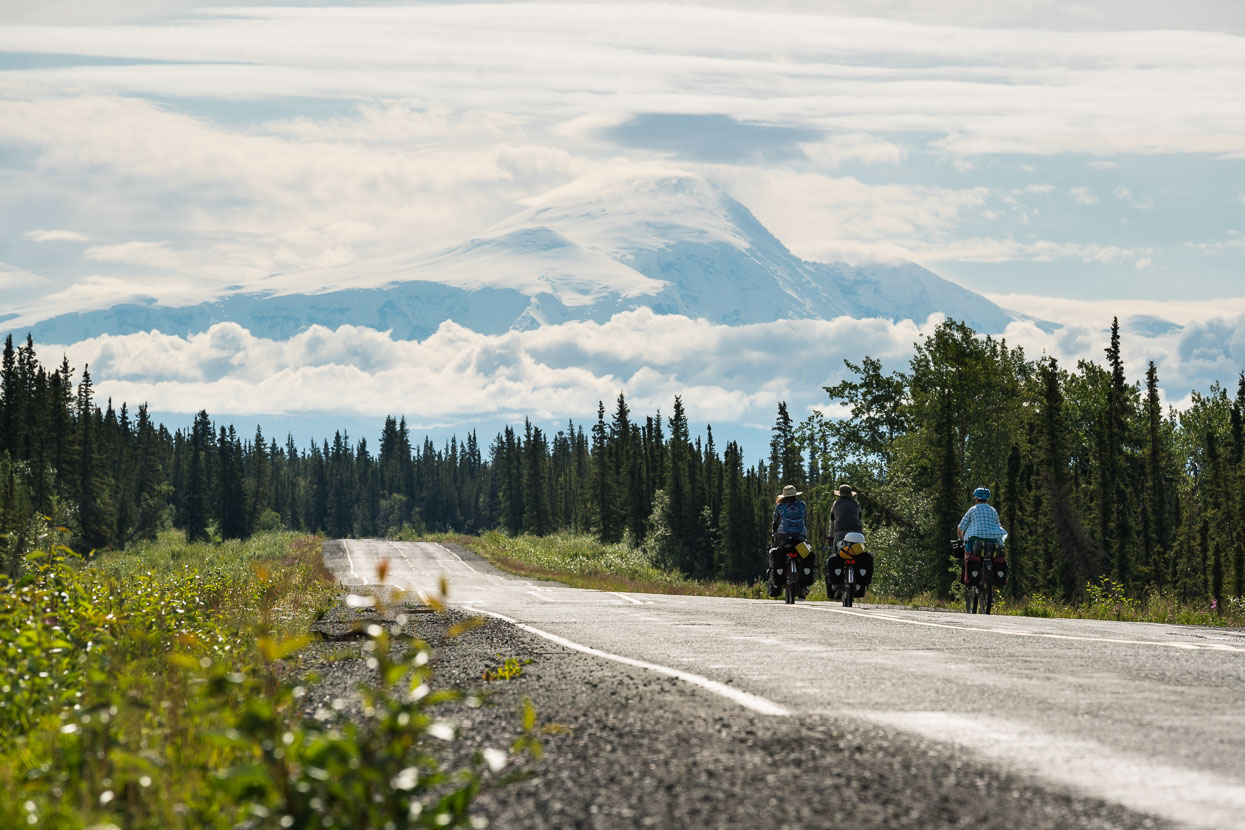 At Sourdough Creek campground we were reunited with Jenny and Curtis, a Texan couple we'd met briefly back in Fairbanks when we stayed with Warmshowers hosts Marilyn and Simon. Jenny and Curtis have retired, hit the road on their Surlys, and are headed for South America as we are, though mostly via a different route. The huge volcano of Mount Sanford (4949m) made an impressive backdrop between the cloud layers as we headed for the Tok Cutoff, our route back northeast towards the Canadian Border.