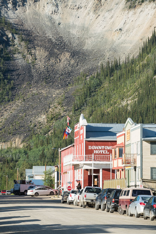 A raw and ungroomed landscape surrounds the town.