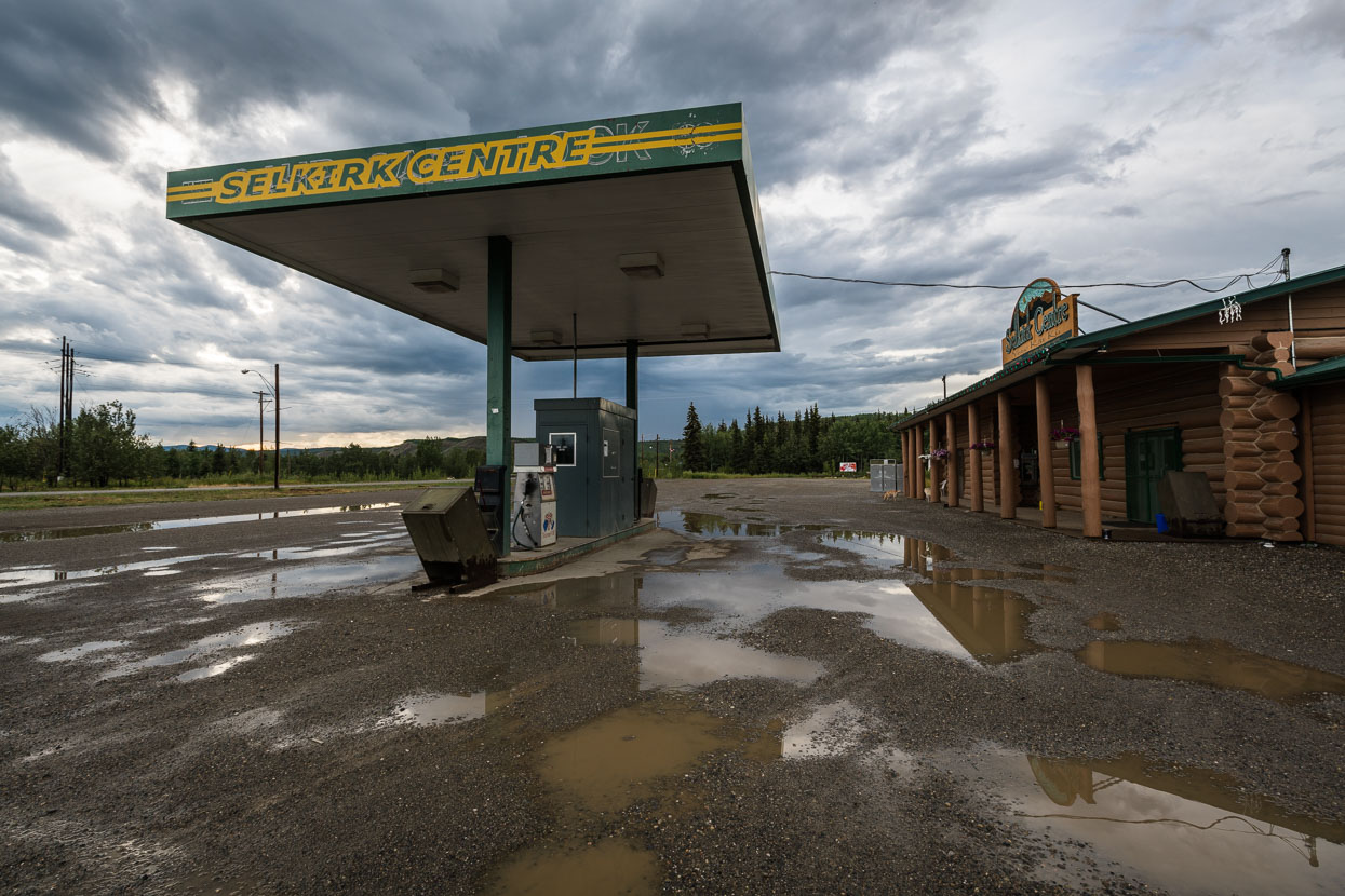 The ride south from Dawson City to Whitehorse is the most repetitive of the trip so far. Mixed spruce forest flanks the highway, and the topography is gently rolling and mostly unchanging. We ride well over 100km each day, sometimes chased by thunderstorms and see the occasional roadhouse for a coffee stop. We camp in a dirt pull in on the first night, and the second arrive in Pelly Crossing, just ahead of a very heavy thunderstorm. After a full day of pedalling, the promise of a 'town' can be exciting - perhaps some bakery snacks, or a burger for dinner. As with many of the stops in Alaska though, Pelly's Crossing was simply a gas station with a very limited selection of groceries, and a small, mostly First Nations population. A run down, free campsite over the road provided a stop for the night.