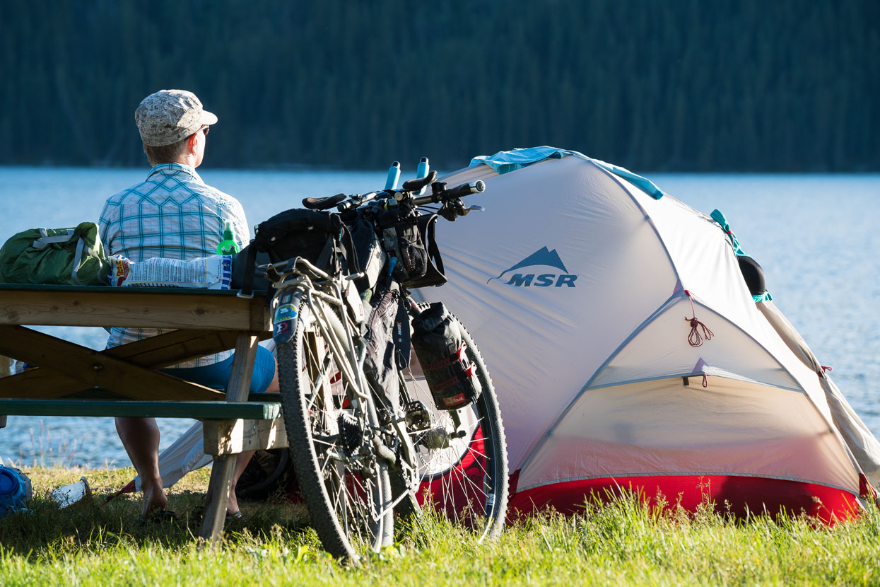 We end the penultimate day to Whitehorse at the Fox Lake campground – a beautiful spot: grass to pitch the tent on and a lake that's warm enough for a dip. Really good campsites have been a rarity so far; so to have a picnic table, grass and a lake is luxury in cycle tourist terms. Some cheeky squirrels keep us entertained too.