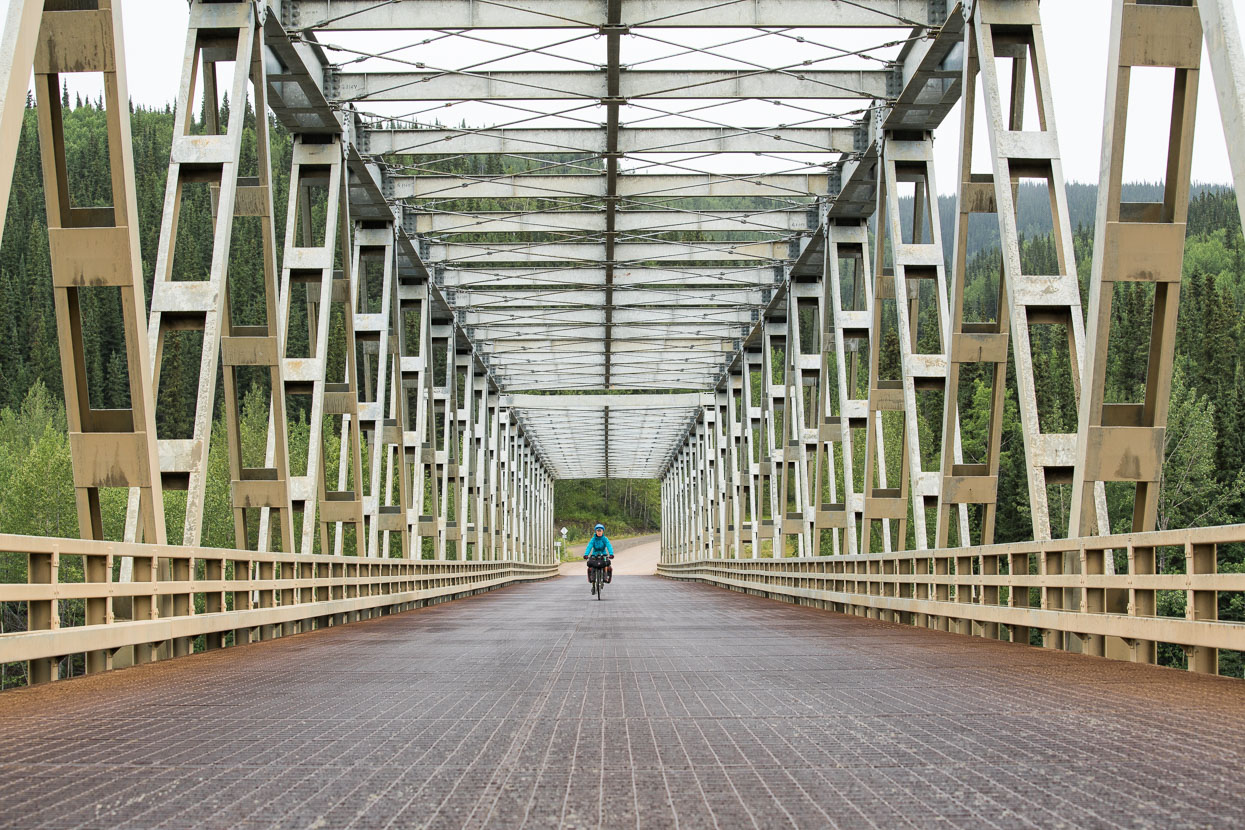 Crossing the Stikine River Bridge. From Sawmill Point on Dease Lake through to Iskut we had a day of persistent rain and lots of up and down through some scenic country, unfortunately the camera stayed in the bag for much of it.